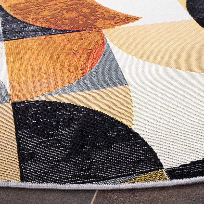 Tapis intérieur / extérieur en polypropylène tissé à la machine abstrait ivoire / noir / bleu Binti, Rond 6 pi 6 po