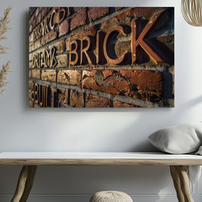 Canvas A Close Up View Of A Richly Textured Brick Wall Wall Art Showcases Prominently Embossed Letters That Spell Brick By Brick Canvas Wall Art