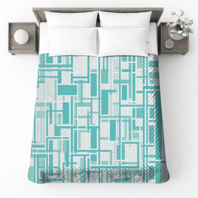 Couvre-lit matelassé bleu géométrique