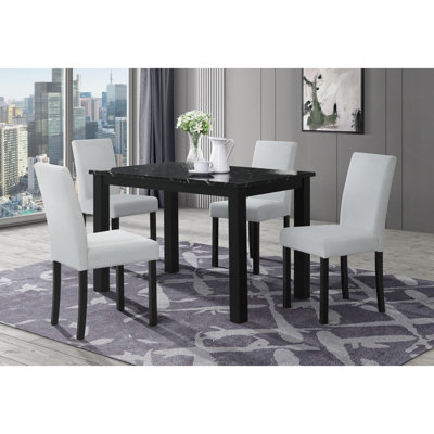 8032 Table noire et (4) chaises argentées