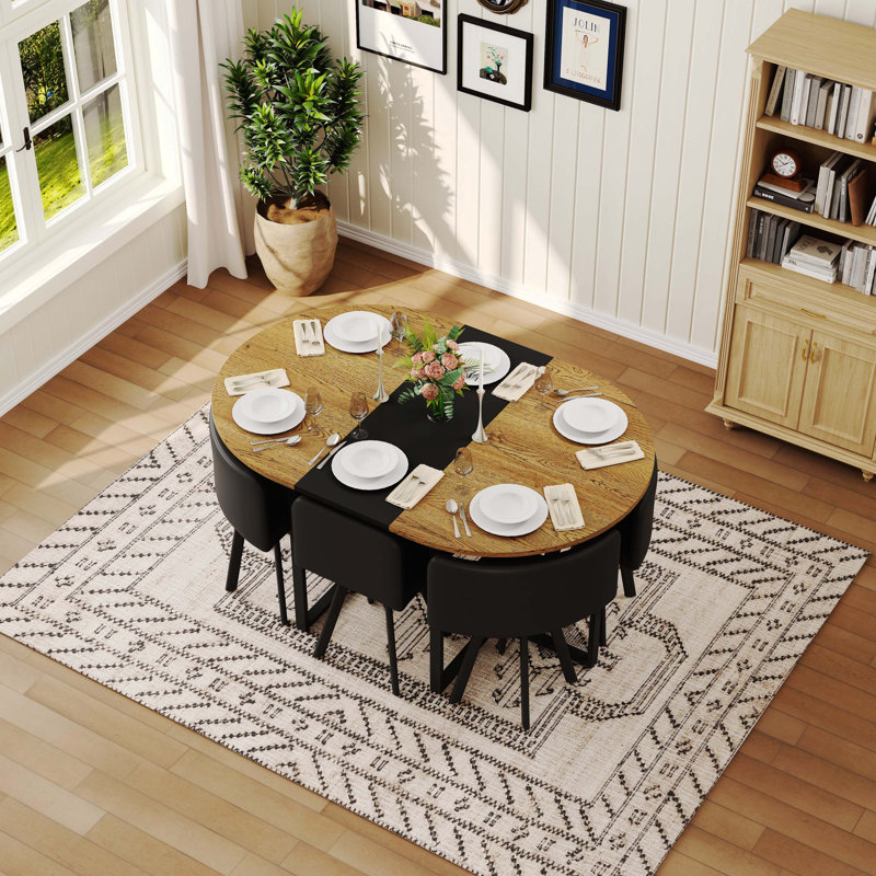 Salle à manger ovale moderne, plateau de table en grain de bois bicolore et chaises en similicuir noir, Noir