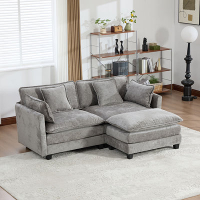 Canapé modulaire en L surdimensionné avec repose-pieds Schmucker