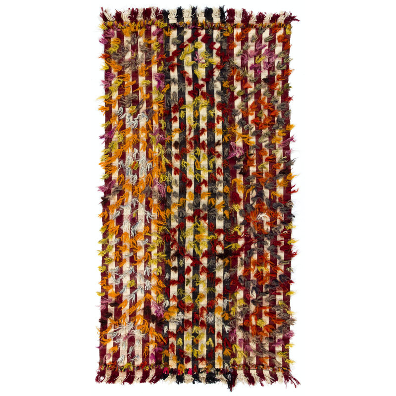 Tapis kilim rétro avec pompons colorés. Housse pour lit, plancher, canapé
