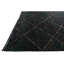 Tapis noir Kalmanovitz