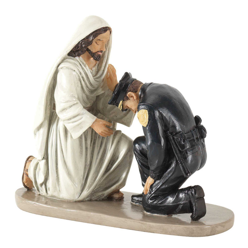 Figurine Jésus et agent de police
