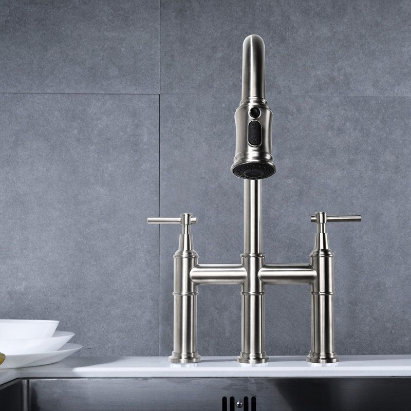 Bridge Kitchen Faucet In Brushed Nickel With Pull-Down . Dual Handle For Precise Water Flow And Temperature Management. 360-Degree Rotating High Nozzle To Enlarge Cleaning Area. Brass Faucet. Quiet