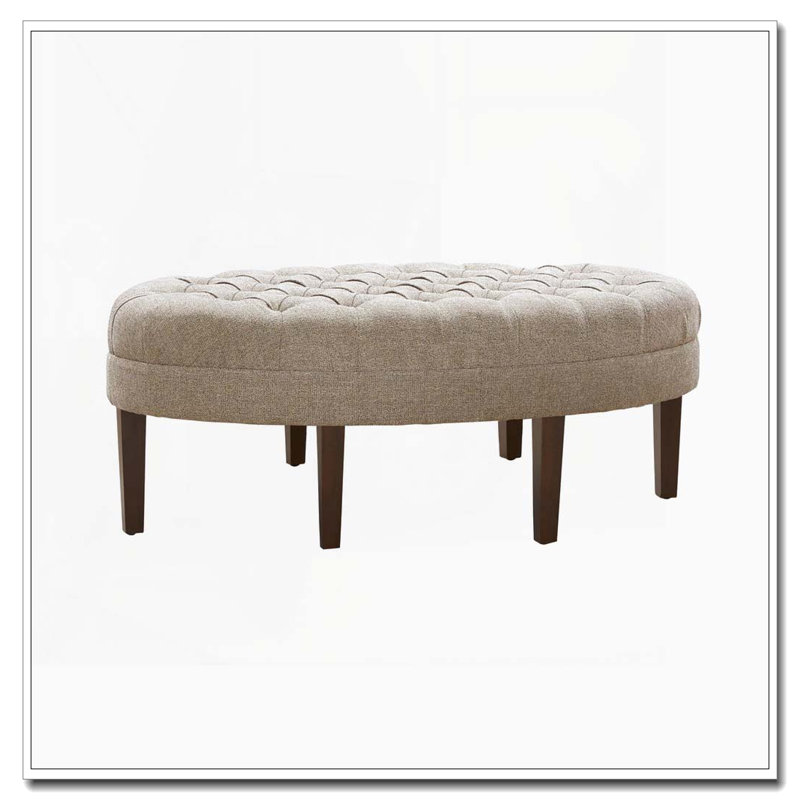 Oval Tufted Ottoman with Solid Wood Legs