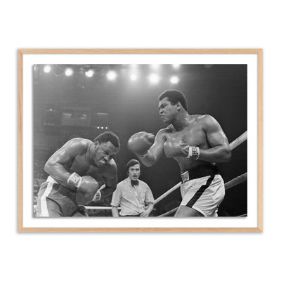 Adom "Muhammad Ali Punching Joe Frazier" Print