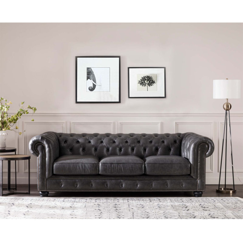 Canapé Chesterfield clouté traditionnel en similicuir
