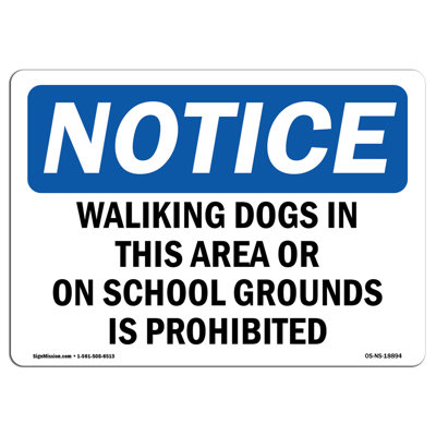 Walking Dogs in This Area or on School Grounds Sign