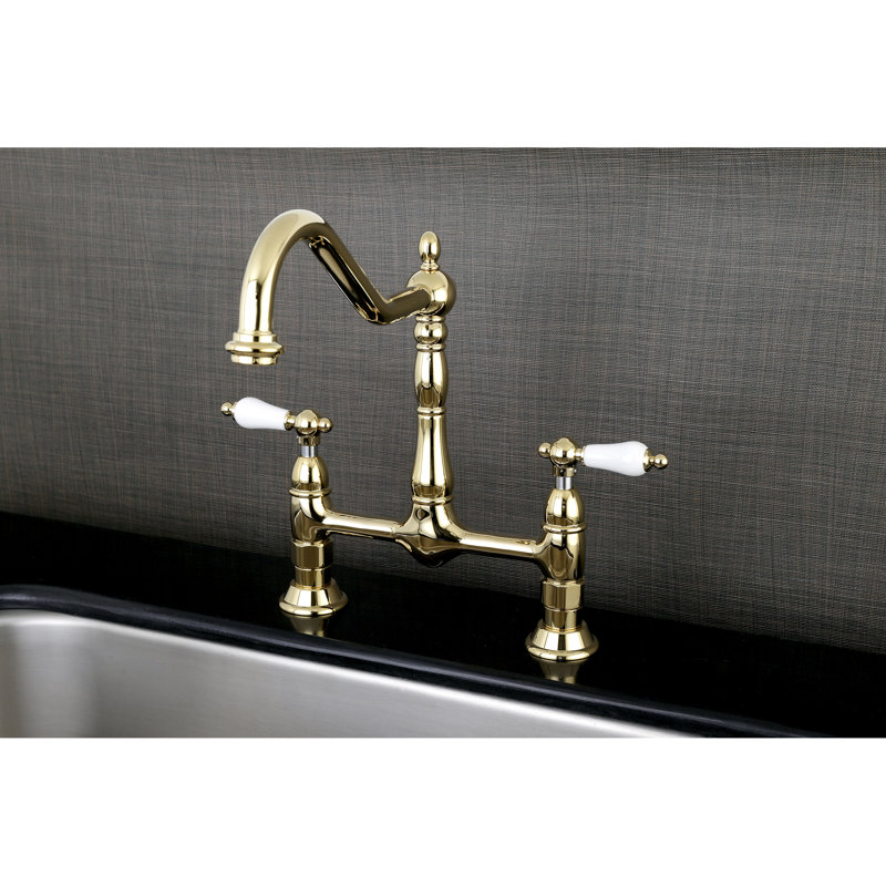 Kingston Brass Heritage Two-Handle 2-Hole Deck Mount Bridge Kitchen Faucet, Without Spray, Polished Brass