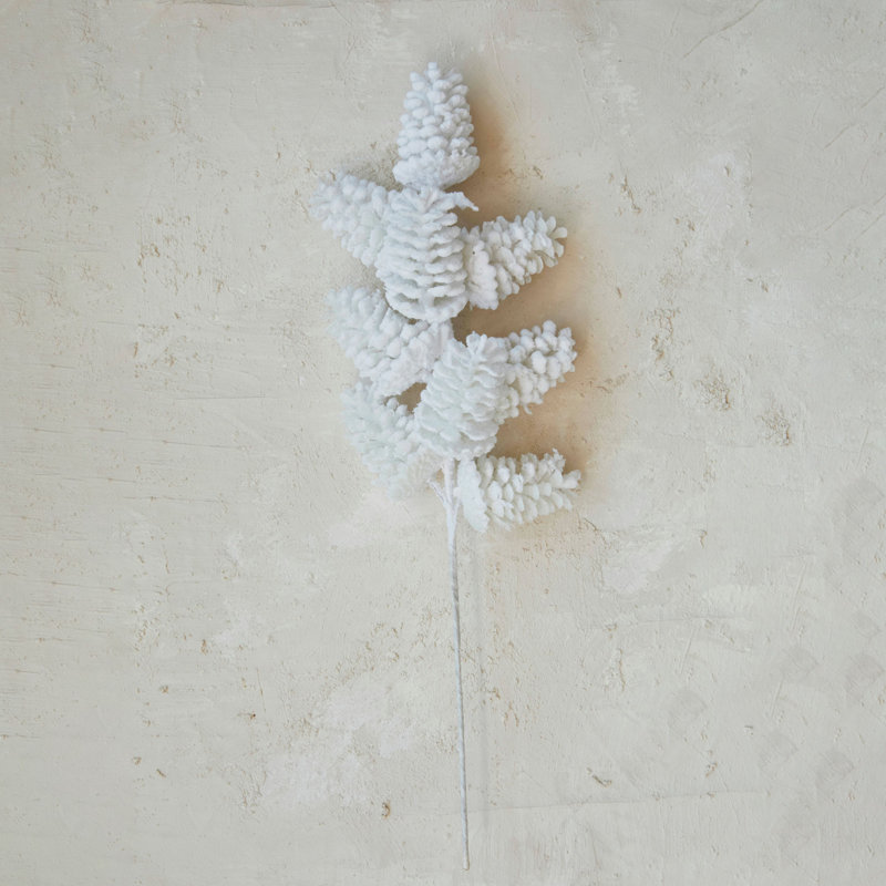 Fausse pomme de pin floquée avec finition neige