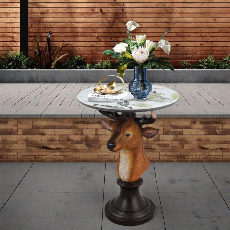 Table de bout avec tête de cerf et plateau en faux marbre