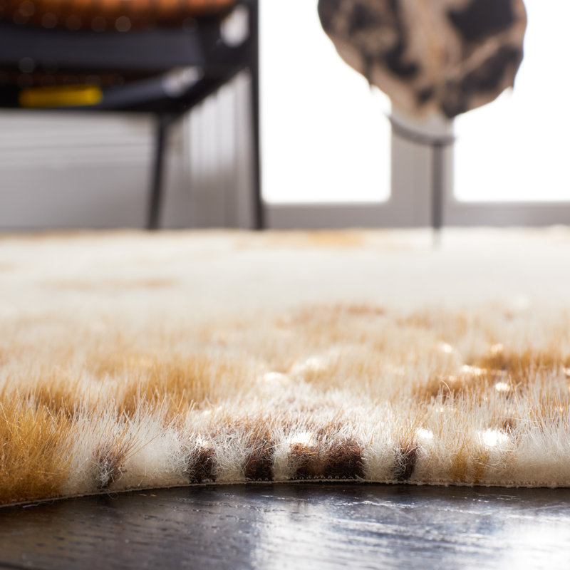 Arcisz Faux Cowhide Performance Rug, Rectangle 4' x 5'