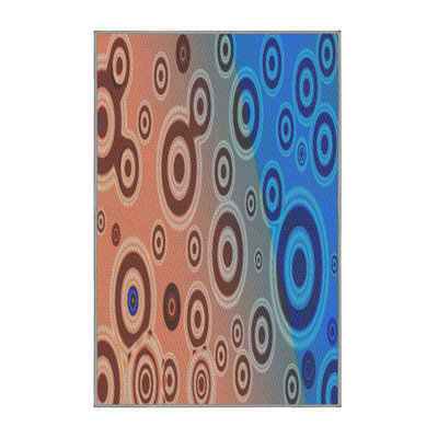 Tapis bleu/orange tissé à la machine