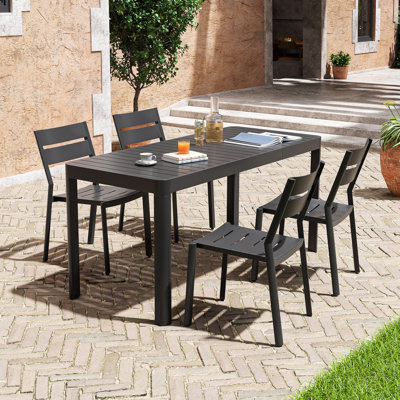 Cadense 4 - Person Aluminum Rectangular Extendable Outdoor Dining Set with Stacking Chairs