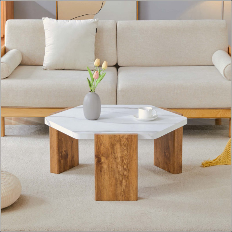 Table basse moderne hexagonale avec surface en marbre, durable et élégante pour les intérieurs contemporains