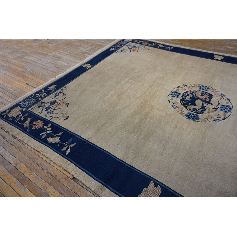 Tapis ivoire antique de Pékin