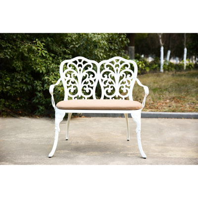 Banc de patio blanc en fonte d'aluminium rembourré avec accent floral rose, adapté pour la pelouse, la beauté des meubles de jardin