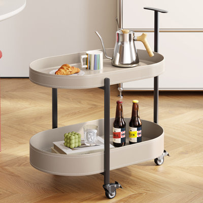 Modern Rolling Side Table with Wheels, Oval 2-Tier Tray End Table with PU Leather Shelves, Mobile Sofa Side Table with Lockable Casters, Compact Night by 17 Stories