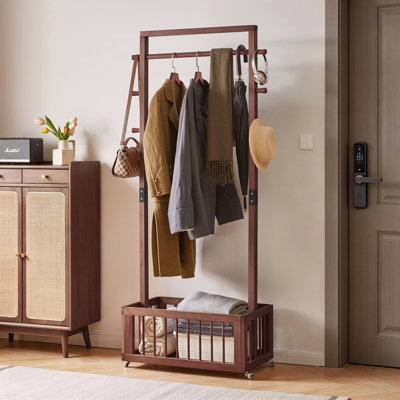 Portemanteau autoportant en bois massif avec roulettes et panier de rangement 19,68 po x 15,75 po x 70,87 po
