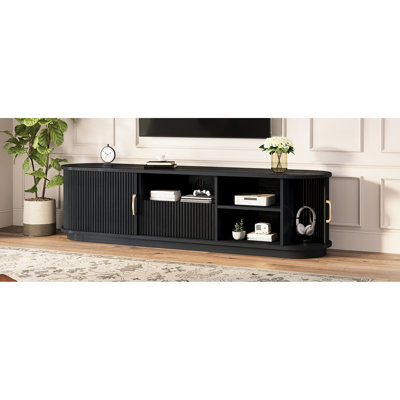Meuble télé noir à grain de bois avec portes coulissantes et tiroir pour téléviseurs de 75 pouces, design rustique rétro, armoire cannelée décorant le salon avec gestion des câbles à lattes, console média
