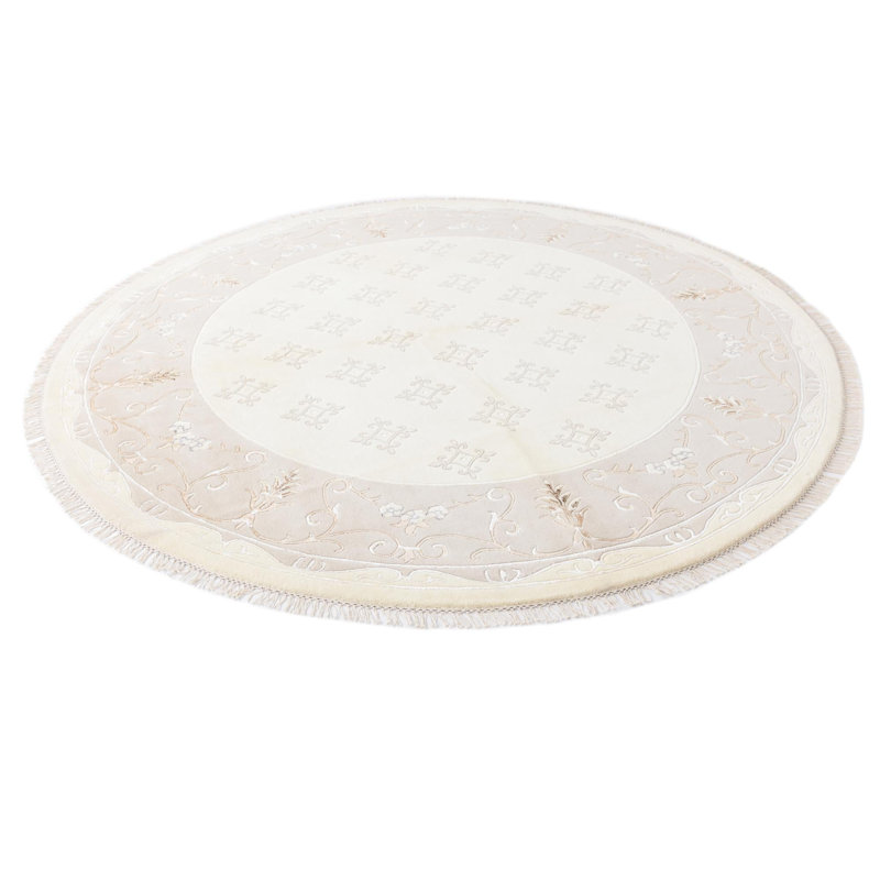 Tapis rond beige clair Howard
