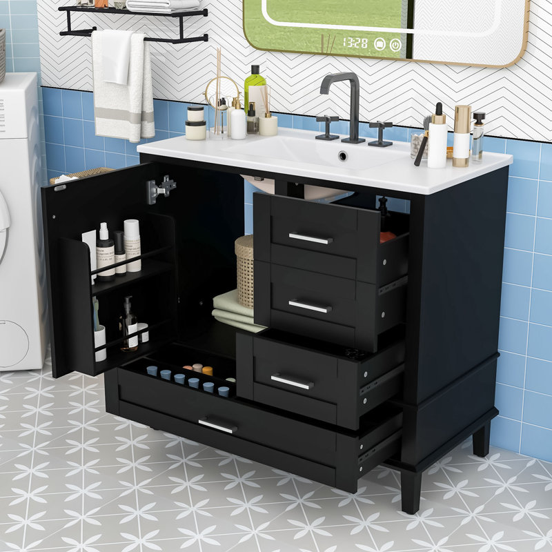Meuble-lavabo autoportant moderne avec lavabo en céramique lisse, porte à fermeture en douceur et rangement polyvalent, Noir