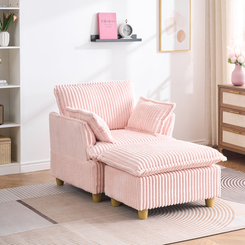 This single-seat corduroy sofa comes with an ottoman and throw pillows. It's perfect for sitting or lying down comfortably in the living room, on the balcony, or in the study