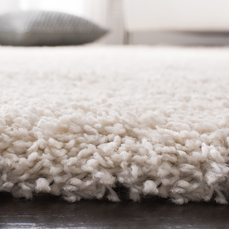 Solid Colour Machine Woven Polypropylene Area Rug in Cream, Rectangle 6'7" x 9'