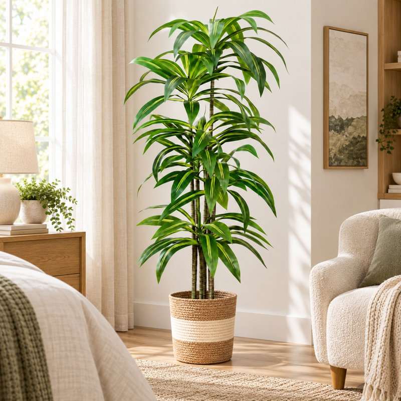 Arbre dracaena artificiel en pot avec des feuilles tropicales réalistes
