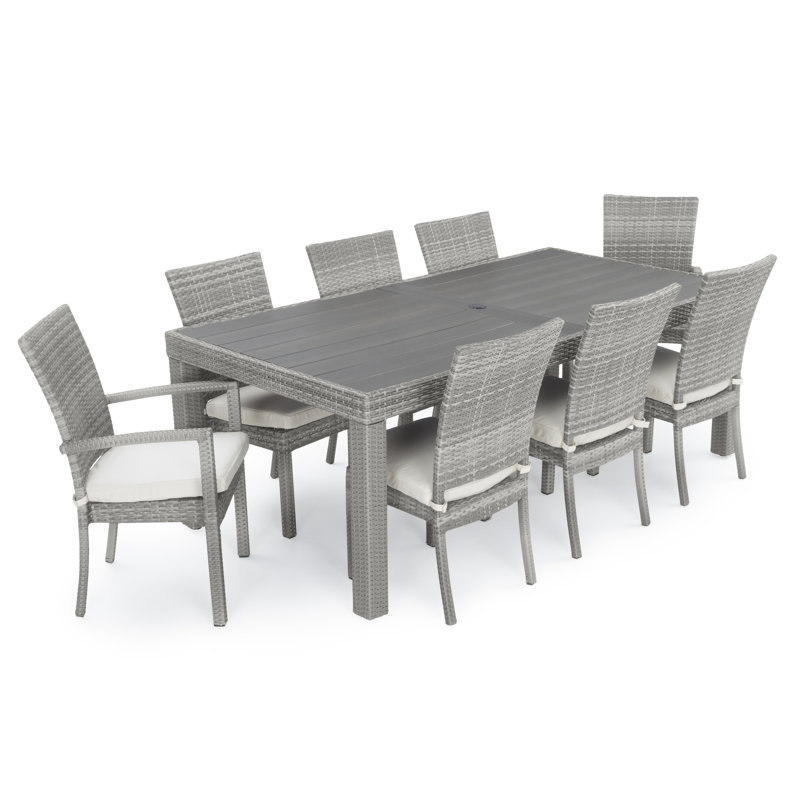 Fionnula 8-Person Rectangular Patio Dining Set with Sunbrella Cushions, Gray Frame/Moroccan Cream Cushion