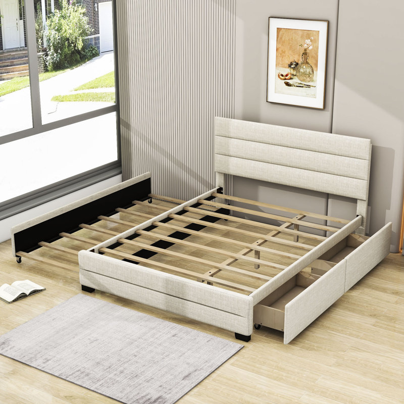 Grand lit plateforme avec rangement capitonné