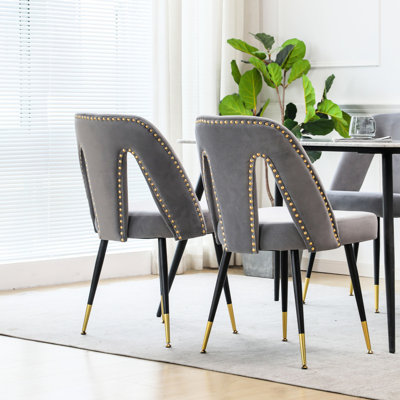 Élégante chaise de salle à manger rembourrée en velours avec pieds en métal noir, rembourrée de mousse, hauteur de 32,28 po, largeur de 20,8 po, chaise moderne à 2 têtes de clous et bout doré de 18,48 po de largeur, profondeur de 24,94 po