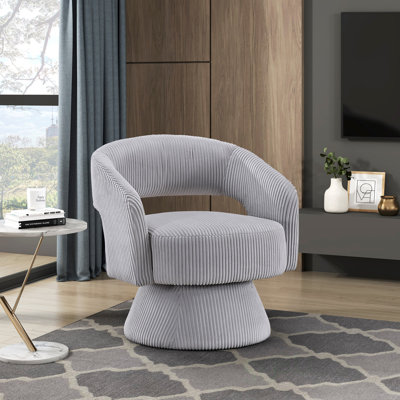 Chaise d'appoint pivotante moderne et luxueuse avec revêtement en velours côtelé gris doux, assise moelleuse et structure en bois massif pour un mobilier élégant