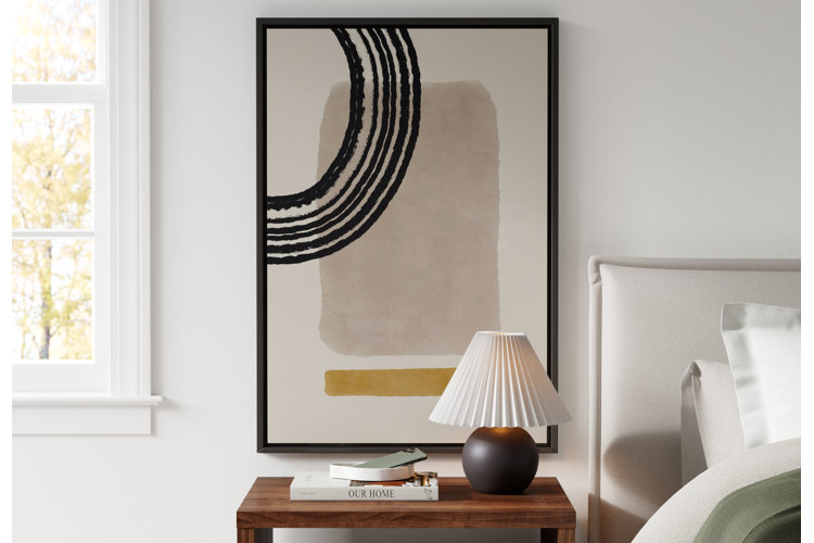 modern bedroom with an abstract art print over the nightstand