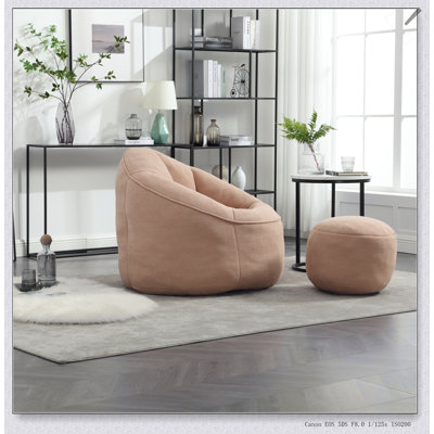 Fauteuil à billes en mousse haute pression avec repose-pieds rembourré pour un confort et une polyvalence ultimes dans n'importe quelle pièce