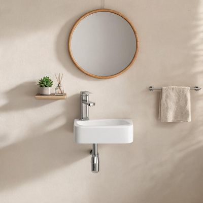 Lavabo-vasque rectangulaire suspendu en céramique blanc laiteux, 35,5 cm x 25,5 cm, avec robinet et bonde.