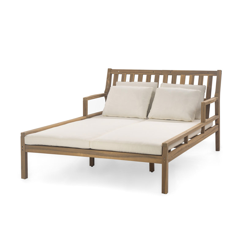 Lit de jour d'extérieur - Avec un design élégant et des coussins, le coussin beige ajoute de l'élégance à l'espace ergonomique pour une utilisation confortable