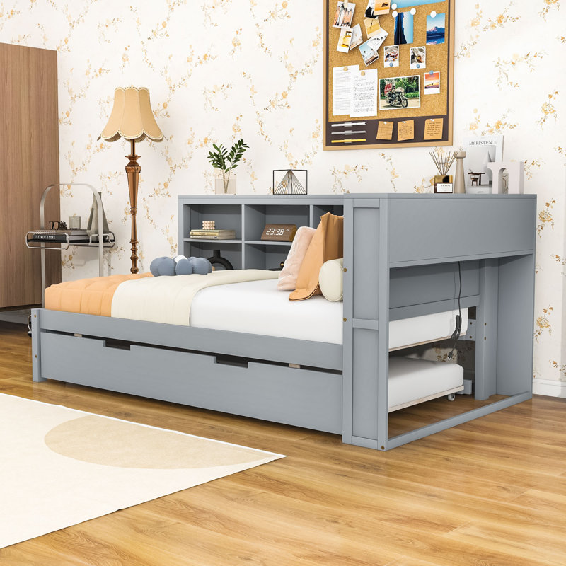 Lit de jour simple avec couchette simple, tablettes de rangement et ports de chargement USB