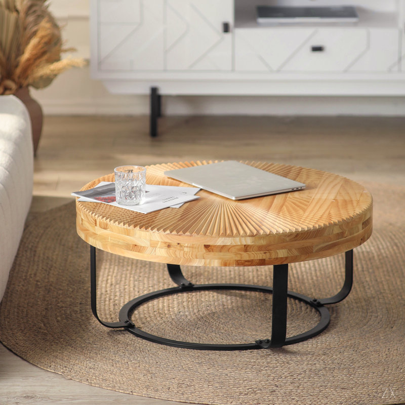 Table basse moderne et ronde à motif sculpté en bois avec pieds en métal