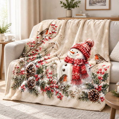 Couverture polaire douce et chaude à motif bonhomme de neige, baies et pommes de pin, idéale pour les fêtes de fin d'année et parfaite pour canapé, chambre ou salon.