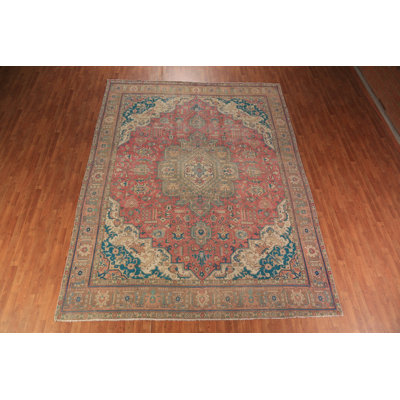 Tapis rose à motif géométrique traditionnel 10 x 13