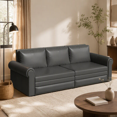 Canapé-lit convertible 3 en 1 avec matelas King dépliable, garniture cloutée, accoudoirs arrondis et coussins amovibles pour salon ou chambre à coucher.