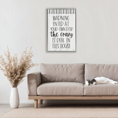 Avertissement, le cadre flottant Crazy is Real, design par Lux + Me Designs