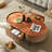 Oval saddle leather coffee table