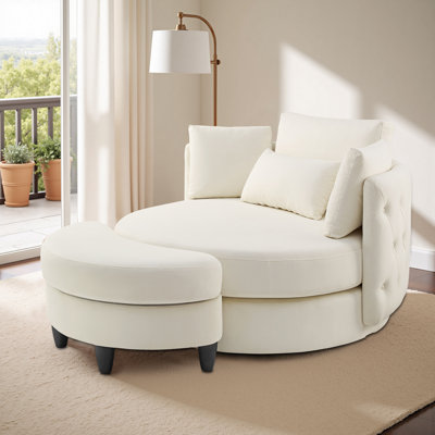 Fauteuil pivotant rembourré capitonné avec repose-pieds