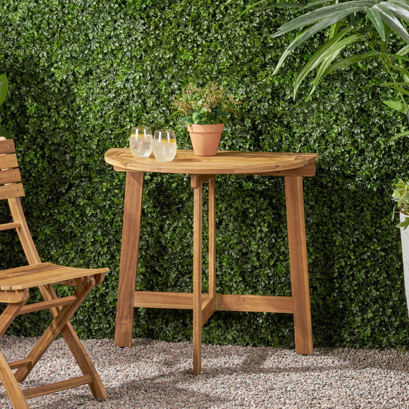 Table bistro en bois naturel pliable pour un rangement sans effort