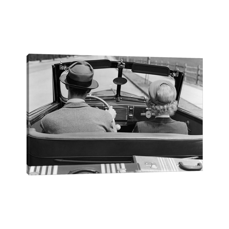 1930s 1940s Rear View Couple Driving Together In Convertible Luggage In Back Seat - Wrapped Canvas Print