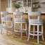 Tabouret de comptoir pivotant rembourré avec structure en bois massif Carollynn-1493860062
